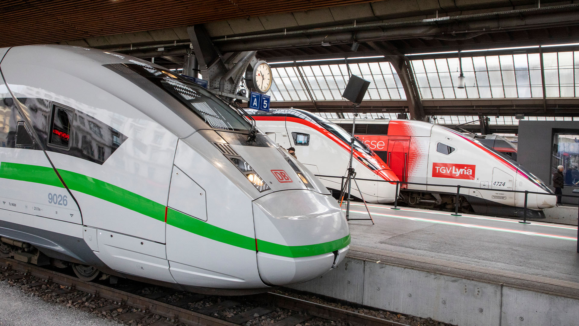 DB, SBB and TGV Lyria trains at the station